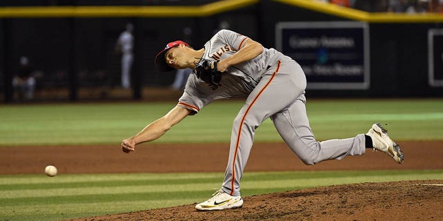 Tyler Rogers #71 of the San Francisco Giants delivers a pitch against the Arizona Diamondbacks at Chase Field on July 4, 2022, in Phoenix, Arizona. 