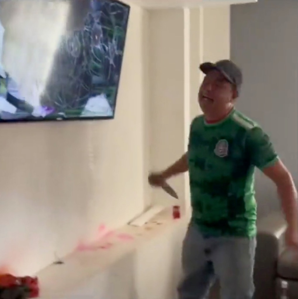 Mexico fan attacks TV with a fan after his team lost