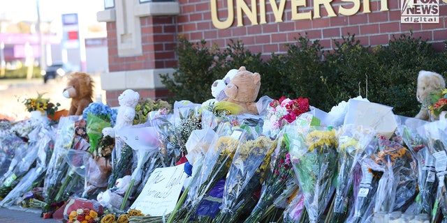 Flowers at an improvised memorial at the University of Idaho in Moscow, Idaho Monday, November 21, 2022, for four of its students who were slain on November 13.