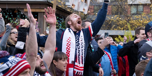 Fans celebrate at a watch party after the World Cup Group B soccer match between Iran and the United States on Tuesday, Nov. 29, 2022, in Washington. The U.S. won 1-0. 