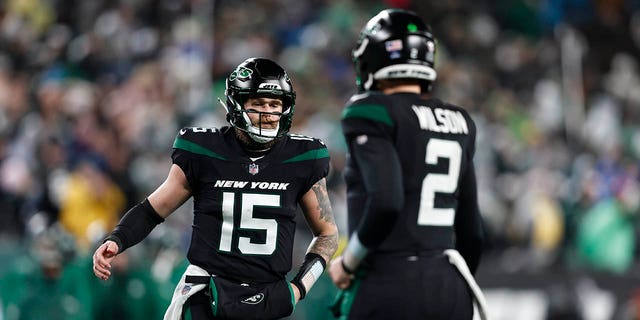 Chris Streveler, #15 of the New York Jets, enters the game to replace Zach Wilson, #2 of the New York Jets, during an NFL football game between the New York Jets and the Jacksonville Jaguars at MetLife Stadium on Dec. 22, 2022 in East Rutherford, New Jersey. 