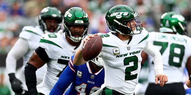 Zach Wilson (2) of the New York Jets scrambles as Von Miller (40) of the Buffalo Bills closes in during the second half at MetLife Stadium Nov. 6, 2022 in East Rutherford, N.J.