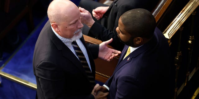 U.S. Rep.-elect Chip Roy (R-TX) (L) talks to Rep.- elect Byron Donalds (R-FL) in the House Chamber during the second day of elections for Speaker of the House at the U.S. Capitol Building on January 4, 2023, in Washington, D.C.