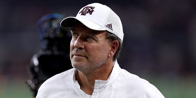 Head coach Jimbo Fisher of the Texas A and M Aggies walks off the field after taking on the Arkansas Razorbacks in the first half of the 2022 Southwest Classic Sept. 24, 2022, in Arlington, Texas. 