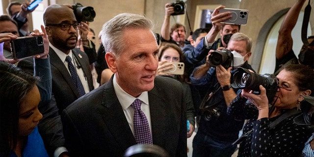 The press corps surrounds House Minority Leader Kevin McCarthy.