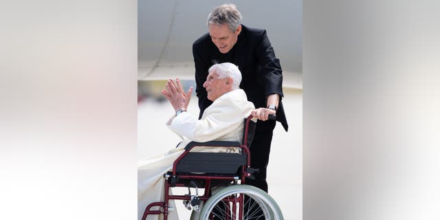 22 June 2020, Bavaria, Freising: Archbishop Georg Gänswein and Pope Emeritus Benedict XVI at Munich Airport on June 22, 2020.