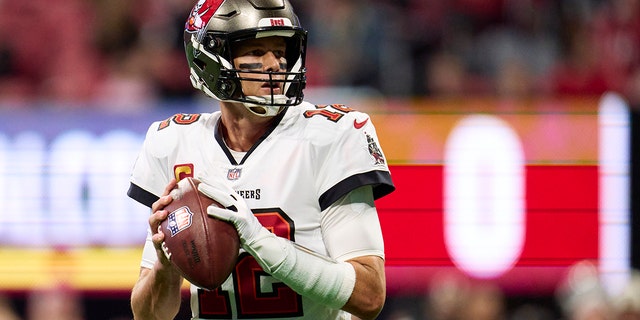 Tom Brady #12 of the Tampa Bay Buccaneers drops back to pass against the Atlanta Falcons during the first half at Mercedes-Benz Stadium on January 8, 2023 in Atlanta, Georgia.