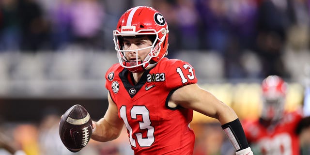 Stetson Bennett #13 of the Georgia Bulldogs runs for a touchdown against the TCU Horned Frogs in the first half of the College Football Playoff National Championship held at SoFi Stadium on January 9, 2023 in Inglewood, California. 