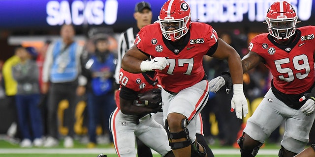 Georgia Bulldogs' Devin Willock run blocks during the CFP National Championship game against the TCU Horned Frogs on Jan. 9, 2023, at SoFi Stadium in Inglewood, California.