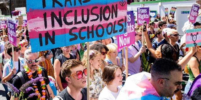 A protester voices support during a pro-transgender march.