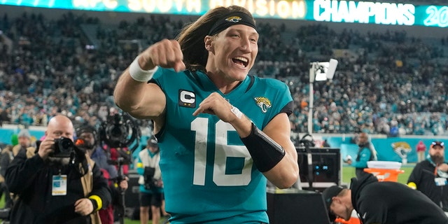 Jaguars quarterback Trevor Lawrence celebrates after defeating the Tennessee Titans on Jan. 7, 2023, in Jacksonville.