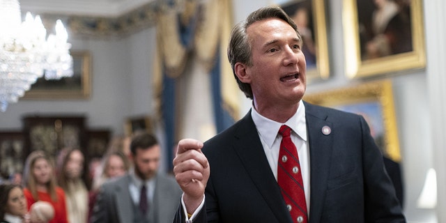 Glenn Youngkin, governor of Virginia, speaks to members of the media following a cabinet swearing-in ceremony at the Virginia Executive Mansion, in Richmond, Virginia, U.S., on Saturday, Jan. 15, 2022. 