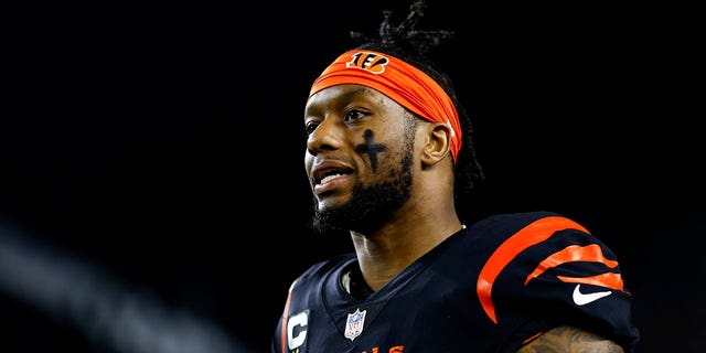 Joe Mixon of the Cincinnati Bengals stretches prior to a game against the Buffalo Bills at Paycor Stadium Jan. 2, 2023, in Cincinnati. 