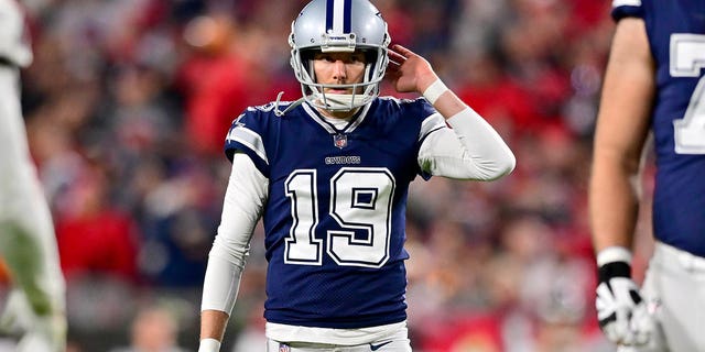 Brett Maher of the Dallas Cowboys reacts after missing an extra point against the Tampa Bay Buccaneers during the third quarter in the NFC wild-card playoff game at Raymond James Stadium on Jan. 16, 2023, in Tampa, Florida.