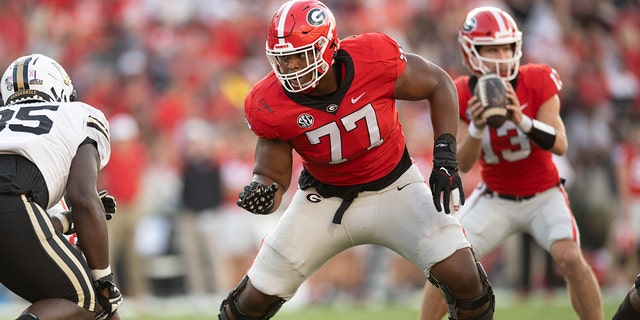 Devin Willock, #77 of the Georgia Bulldogs, at the in action against the Vanderbilt Commodores at Sanford Stadium on Oct. 15, 2022 in Athens, Georgia.