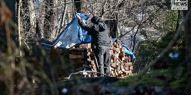 Massachusetts State Police troopers and other officials searched the property, backyard, pool and surrounding area of missing woman Ana Walshe's home in Cohasset on Saturday, Jan. 7, 2023.