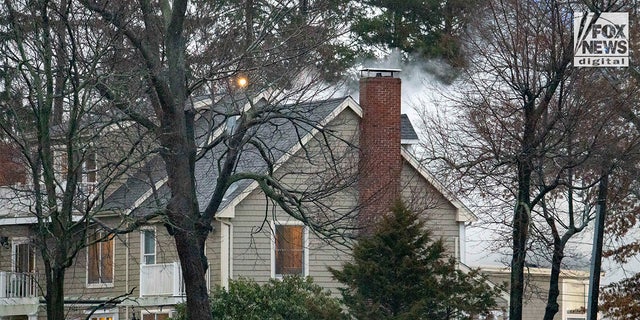 Firefighters battle a blaze at 725 Jerusalem Road in Cohasset, Mass., on Friday, Jan. 7, 2023. The home once belonged to Ana Walshe, who was reported missing after vanishing on New Year's Day.