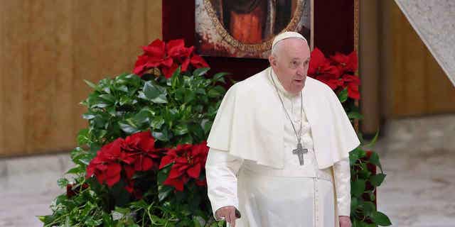 Pope Francis prays in front of the icon of the Madonna del Popolo, venerated by Belarusians and Ukrainians, during the general audience in the Paul VI Hall. Vatican City, Jan. 11, 2023.