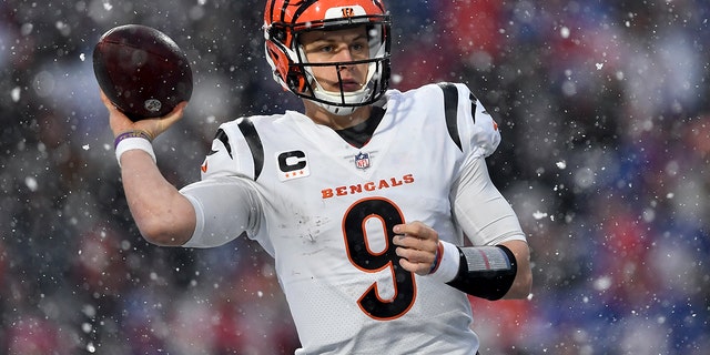 Cincinnati Bengals quarterback Joe Burrow passes against the Buffalo Bills, Sunday, Jan. 22, 2023, in Orchard Park, New York.