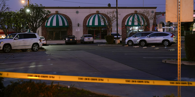 Police tape cordons off the Star Ballroom Dance Studio in Monterey Park, California, on Sunday, Jan. 22.