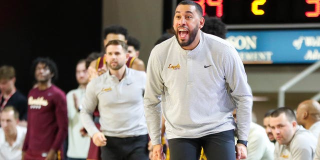 Head coach Drew Valentine of the Loyola Ramblers shouts instructions to his team during a game against the Davidson Wildcats Jan. 4, 2023, at John M. Belk Arena in Davidson, N.C.