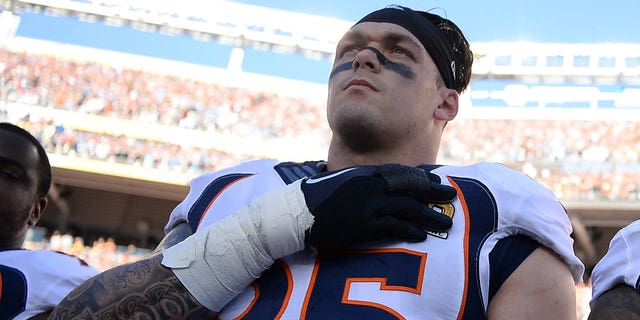 Derek Wolfe of the Denver Broncos stands on the sidelines during the national anthem before the start of the game. The Denver Broncos played the Carolina Panthers in Super Bowl 50 at Levi's Stadium in Santa Clara, Calif., on February 7, 2016.