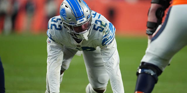 Jessie Lemonier, #52 of the Detroit Lions, gets set against the Denver Broncos during an NFL game at Empower Field At Mile High on Dec. 12, 2021 in Denver.