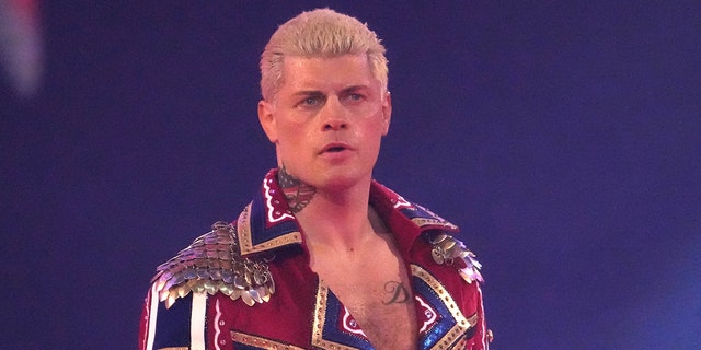 Apr 2, 2022; Arlington, TX, USA; Cody Rhodes enters the arena during WrestleMania at AT&amp;T Stadium.