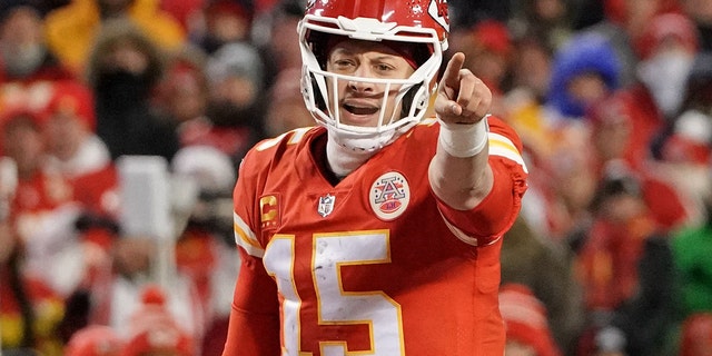 Kansas City Chiefs quarterback Patrick Mahomes, #15, gestures before the snap against the Cincinnati Bengals during the third quarter of the AFC Championship game at GEHA Field at Arrowhead Stadium Jan. 29, 2023, in Kansas City, Missouri.