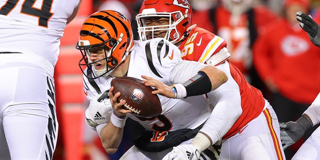 Chris Jones of the Chiefs sacks Joe Burrow of the Cincinnati Bengals during the AFC Championship Game at GEHA Field at Arrowhead Stadium on Jan. 29, 2023, in Kansas City, Missouri.