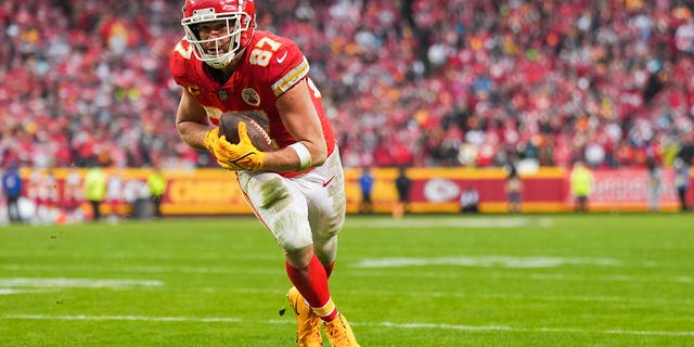 Travis Kelce of the Chiefs makes the touchdown catch against the Jacksonville Jaguars on Jan. 21, 2023, in Kansas City, Missouri.