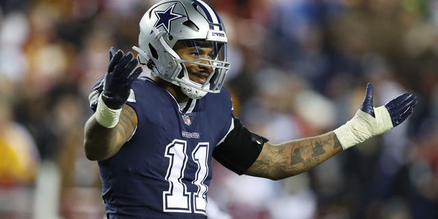 Micah Parsons, #11 of the Dallas Cowboys, looks on during the second half of the game against the Washington Commanders at FedExField on Jan. 8, 2023 in Landover, Maryland.