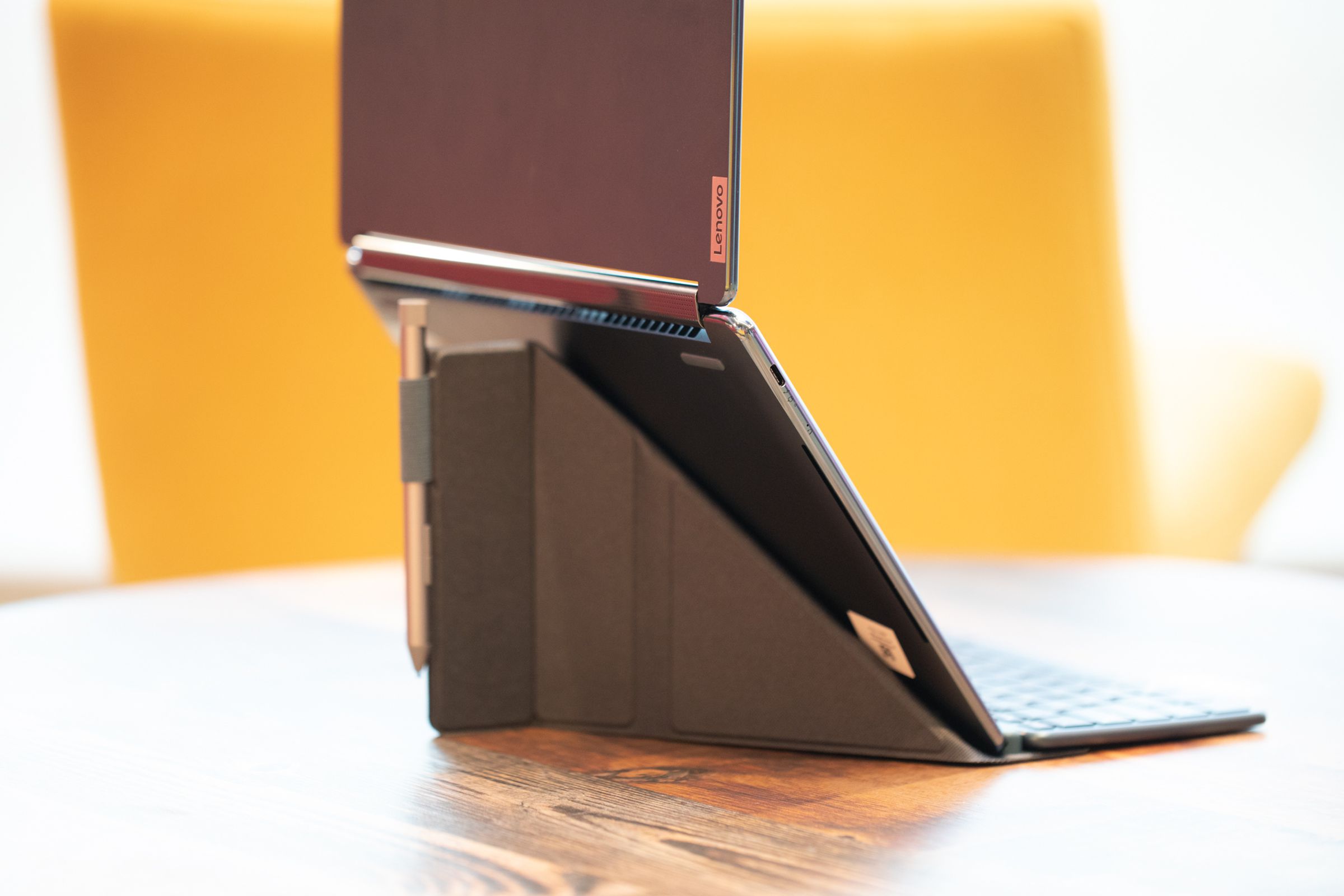 The stylus on the back of the Lenovo Yoga Book 9i kickstand.