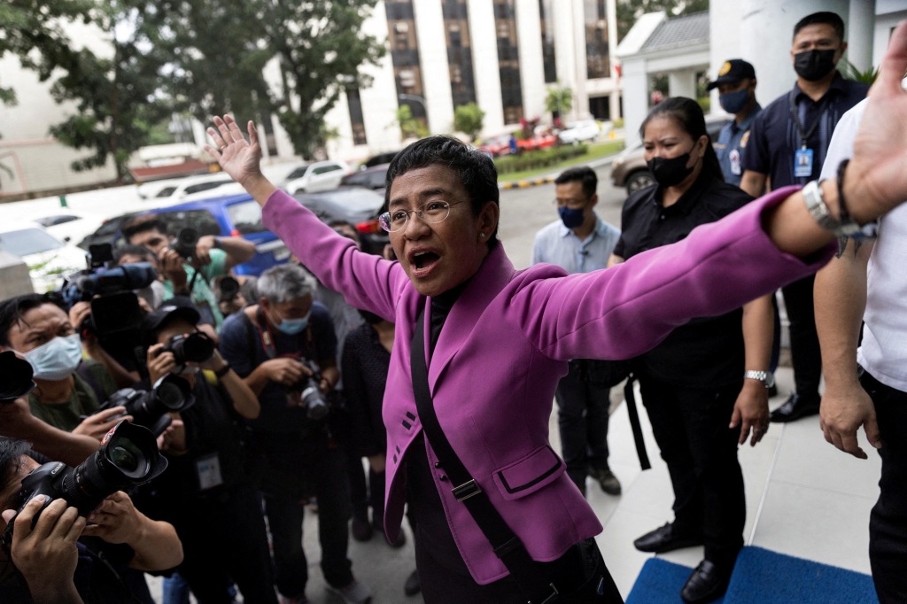 Rappler CEO and Nobel Laureate Maria Ressa gestures after a Manila court acquitted her from a tax evasion case in Quezon City, Philippines, on Jan. 18, 2023. 