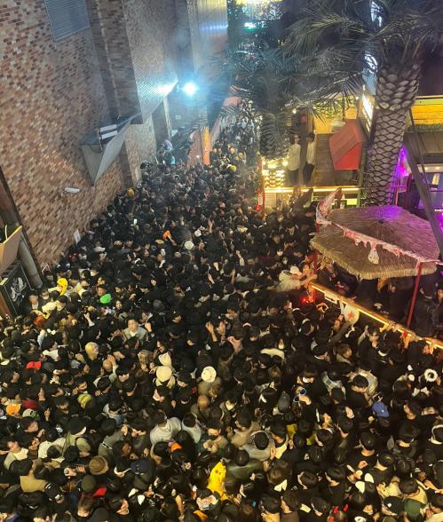 A street in Itaewon district is pictured full of people before the deadly stampede in Seoul, South Korea on Oct. 30, 2022.