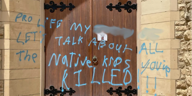 The front door of the St. Bernard Catholic Church in Madison, Wisconsin, was vandalized July 3, 2022.