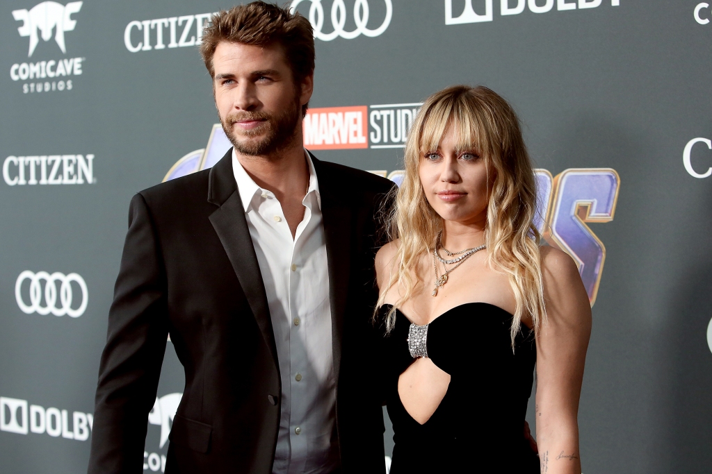 LOS ANGELES, CA - APRIL 22:  (L-R) Liam Hemsworth and Miley Cyrus attend the Los Angeles World Premiere of Marvel Studios' "Avengers: Endgame" at the Los Angeles 