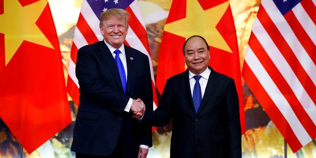 President Donald Trump meets with Vietnamese Prime Minister Nguyen Xuan Phuc at the Office of Government Hall.