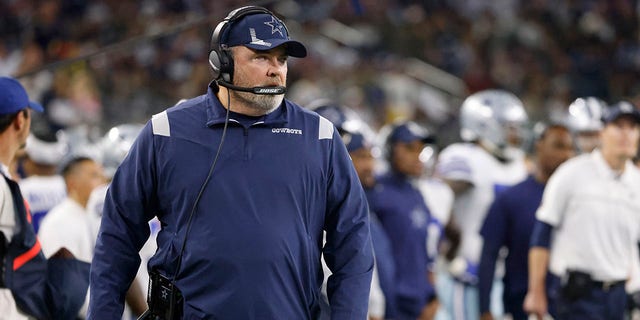 Dallas Cowboys head coach Mike McCarthy watches play against the Las Vegas Raiders in the first half of a game in Arlington, Texas, Nov. 25, 2021.