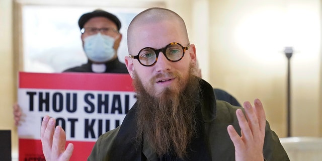 The Rev. Jeffrey Hood, of Arkansas, speaks to the media before protestors deliver petitions against the death penalty to the office of Oklahoma Gov. Kevin Stitt, Wednesday, Jan. 11, 2023, in Oklahoma City.