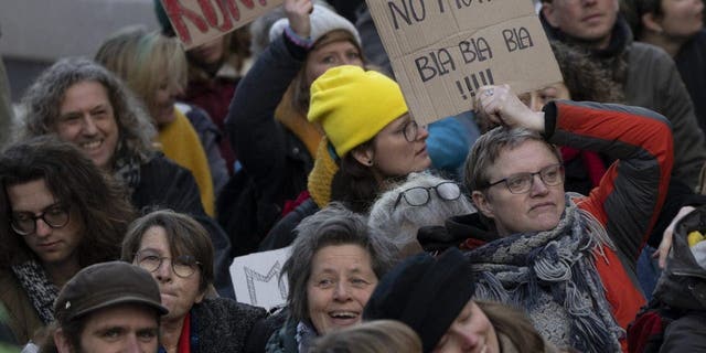 Extinction Rebellion activists and sympathisers shouted slogans against global warming when blocking a busy road in The Hague, Netherlands, Saturday, Jan. 28, 2023. Earlier this week seven Extinction Rebellion activists were detained by authorities for sedition linked to the protest. 