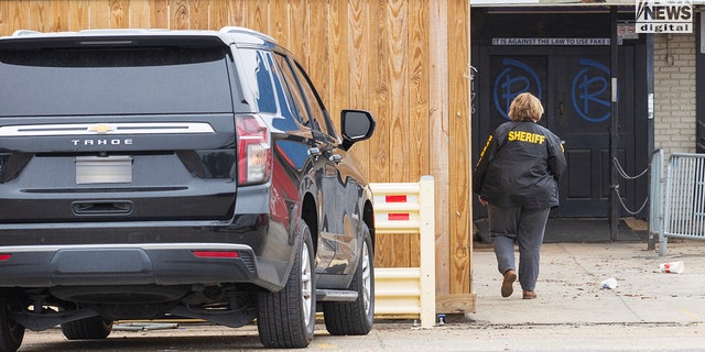 Investigators are seen outside of  Reggie’s bar in Baton Rouge, Louisiana on Tuesday, January 24, 2023. The bar is reportedly one of the last places where LSU student, Madison Morgan was seen before her death on January 15.