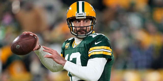 Aaron Rodgers, #12 of the Green Bay Packers, warms up prior to the game against the Detroit Lions at Lambeau Field on Jan. 8, 2023 in Green Bay, Wisconsin.