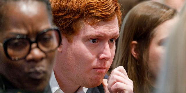 Alex Murdaugh's son, Buster Murdaugh, listens to testimony during his father's murder trial at Colleton County Courthouse in Walterboro, South Carolina, Jan. 27, 2023.