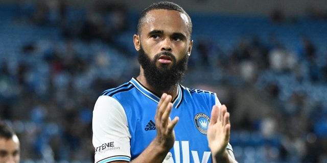 Charlotte FC defender Anton Walkes acknowledges fans after their tie against Columbus Crew at Bank of America Stadium on Oct. 5, 2022.