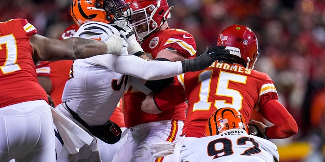 Cincinnati Bengals' Joseph Ossai goes after Chiefs quarterback Patrick Mahomes, Sunday, Jan. 29, 2023, in Kansas City.