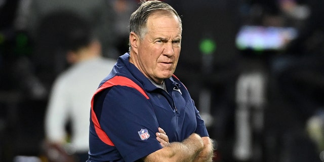 Head coach Bill Belichick of the New England Patriots prepares for a game against the Arizona Cardinals at State Farm Stadium Dec. 12, 2022, in Glendale, Ariz.