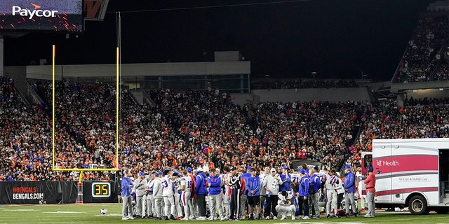 The Buffalo Bills players pray for teammate Damar Hamlin during the first half of an NFL football game against the Cincinnati Bengals, Monday, Jan. 2, 2023, in Cincinnati. The game has been postponed after Buffalo Bills' Damar Hamlin collapsed, NFL Commissioner Roger Goodell announced.