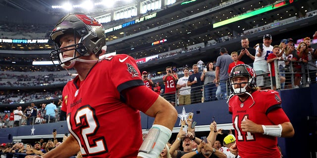 Tom Brady (12) of the Tampa Bay Buccaneers takes the field before a game against the Dallas Cowboys at AT and T Stadium Sept. 11, 2022, in Arlington, Texas.