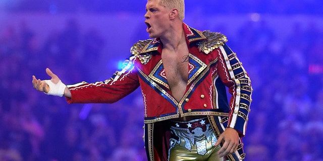 Apr 2, 2022; Arlington, TX, USA; Cody Rhodes enters the arena during WrestleMania at AT&amp;T Stadium.